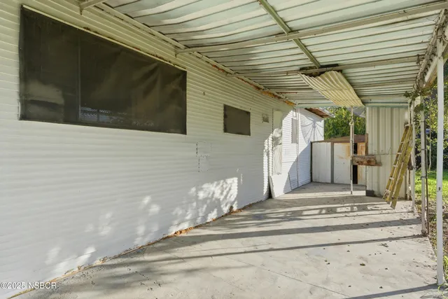 a view of a entryway door of the house