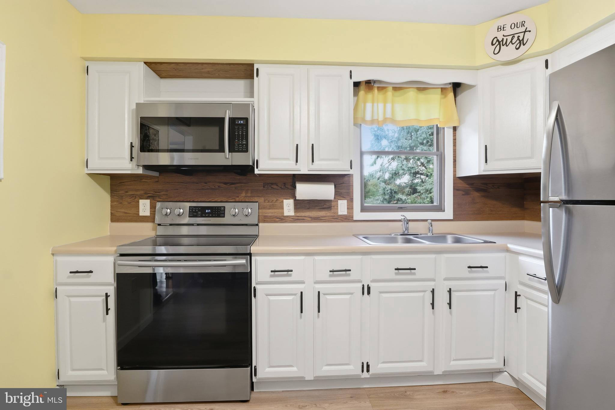 935 Pleasant Grove Road Red Lion, PA 17356 - Photo 11 of 70 a kitchen with cabinets appliances and a counter space