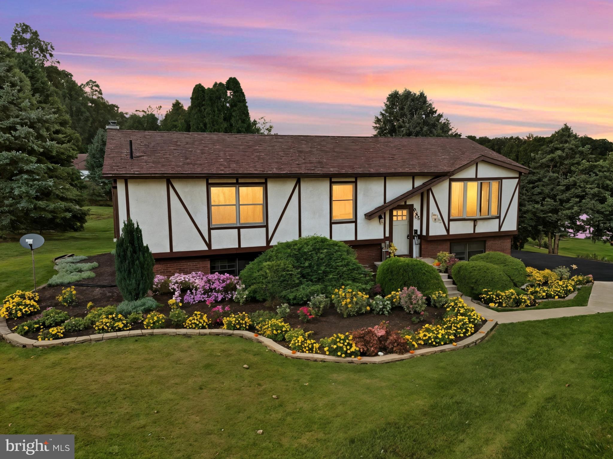 935 Pleasant Grove Road Red Lion, PA 17356 - Photo 2 of 70 a view of a house with a garden