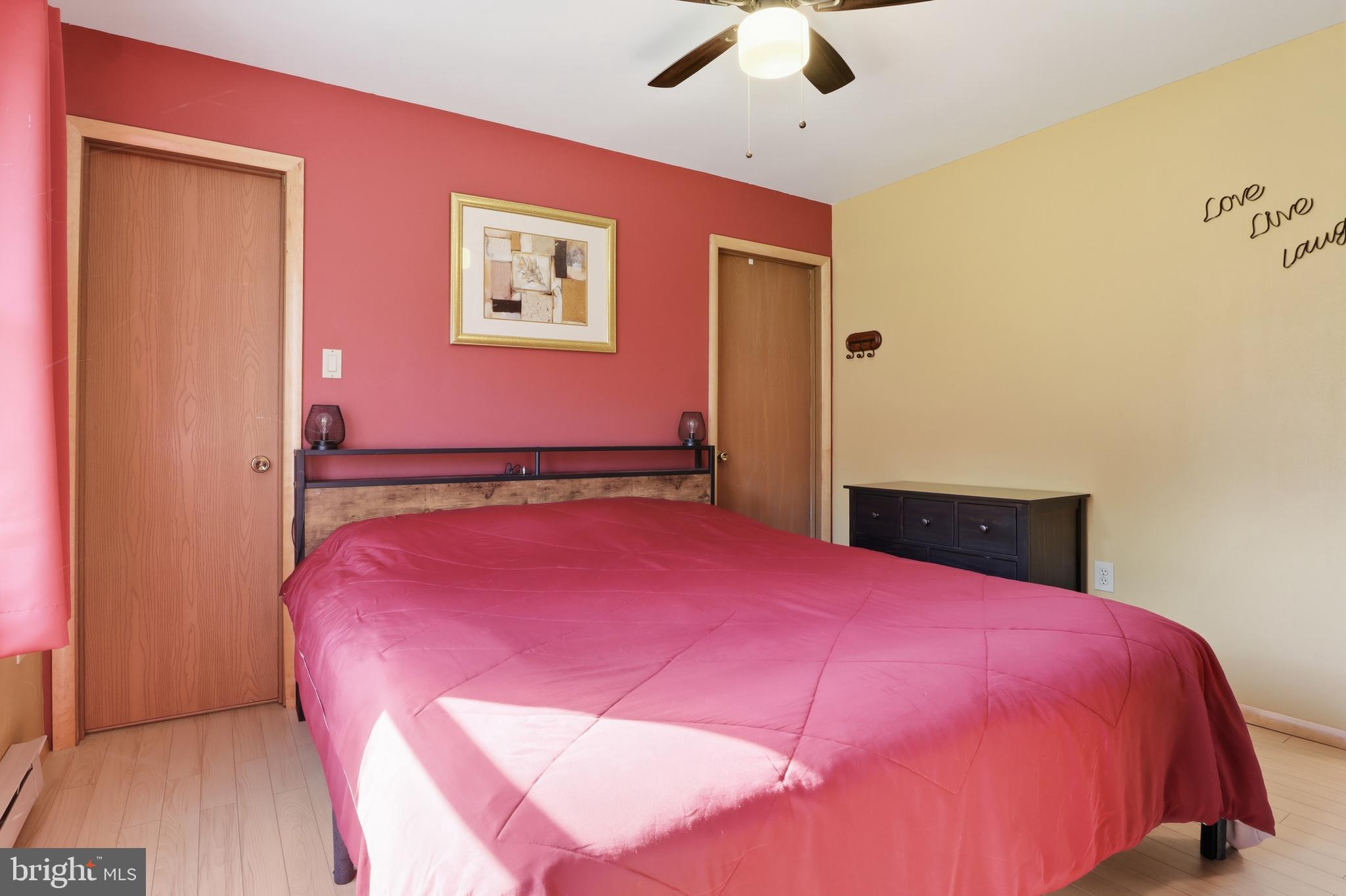 935 Pleasant Grove Road Red Lion, PA 17356 - Photo 22 of 70 a bed room with a bed and a ceiling fan