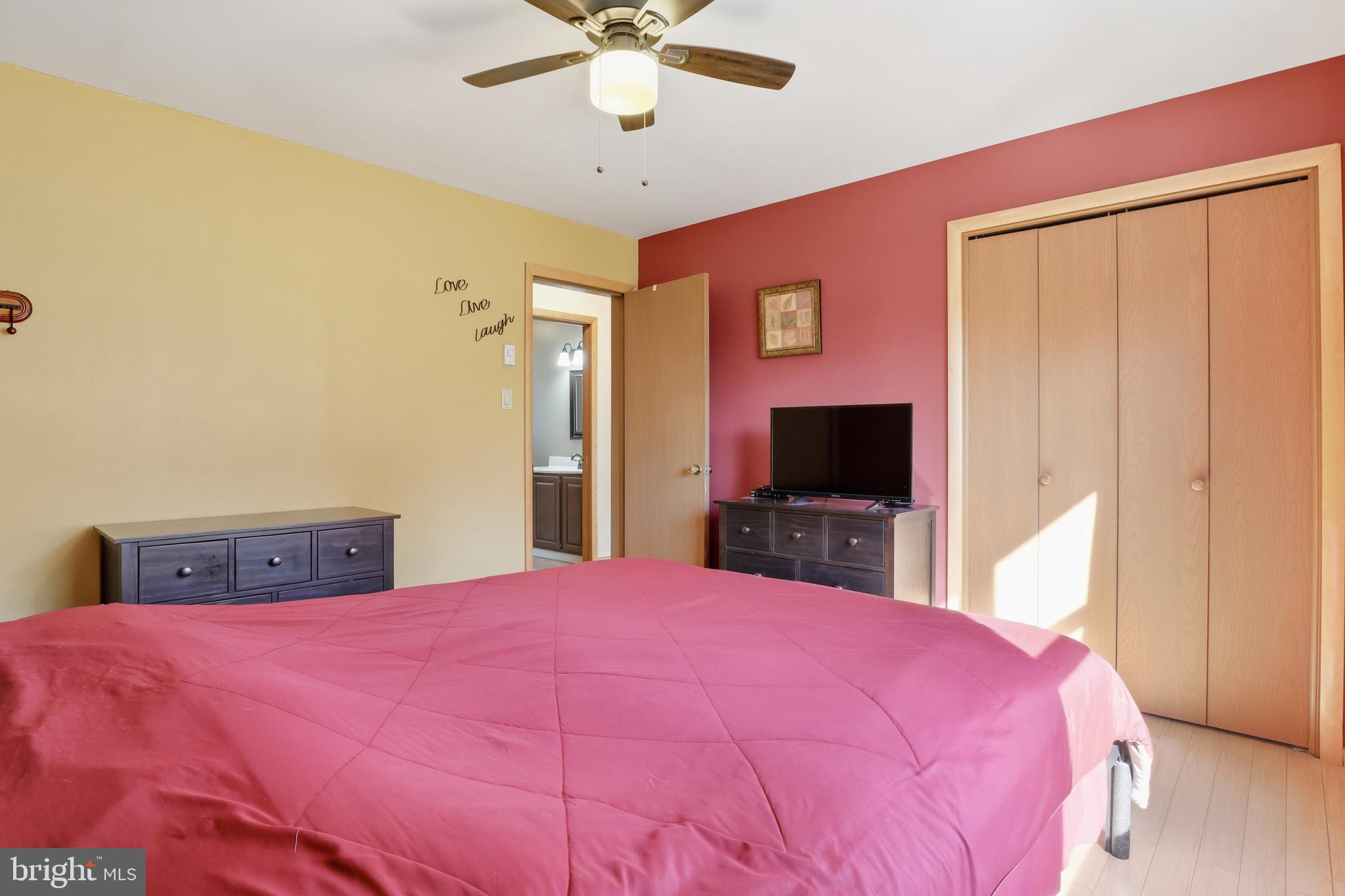 935 Pleasant Grove Road Red Lion, PA 17356 - Photo 23 of 70 a bedroom with a bed and a flat screen tv