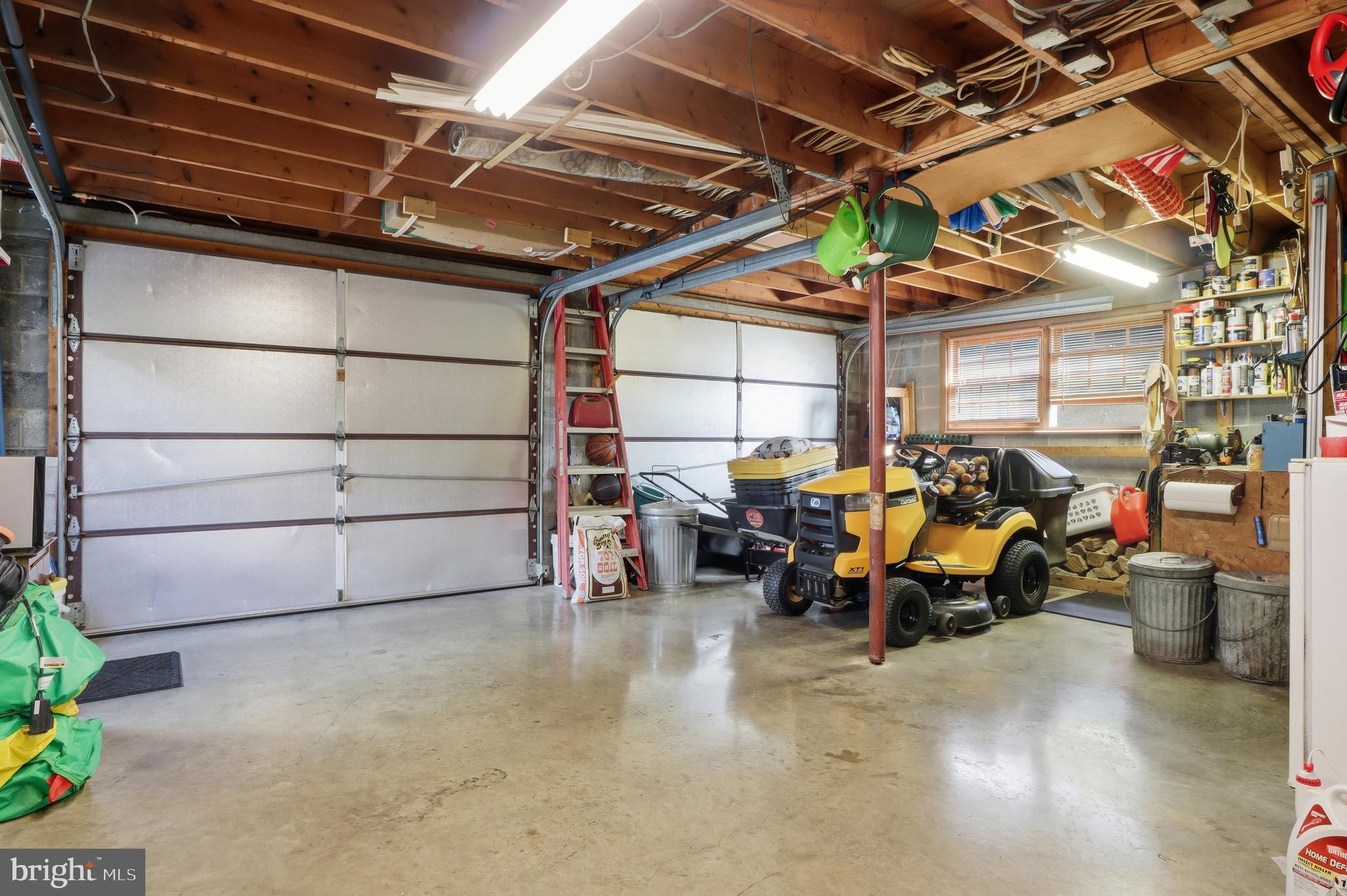 935 Pleasant Grove Road Red Lion, PA 17356 - Photo 33 of 70 a view of a garage with a table and chairs