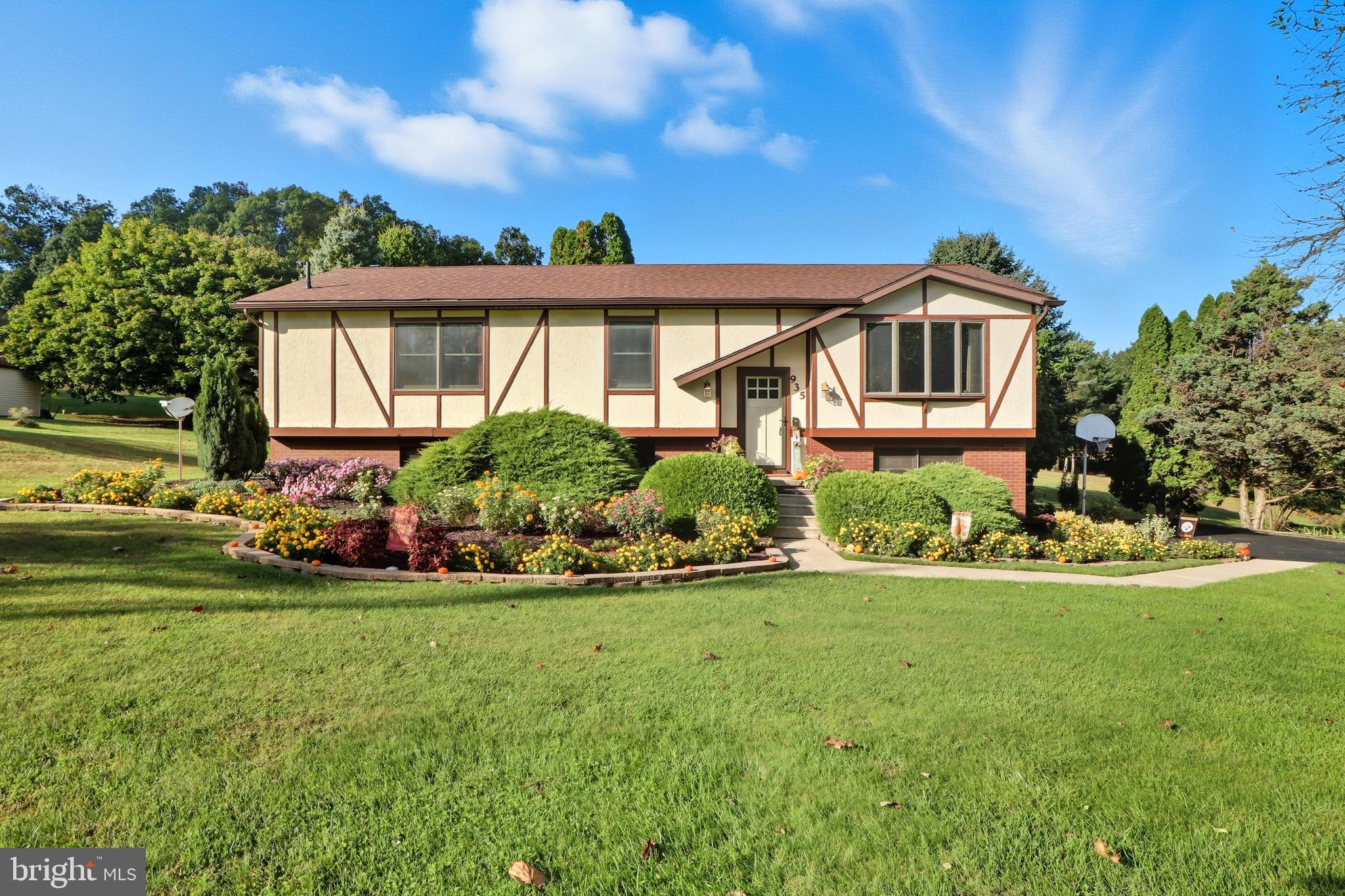 935 Pleasant Grove Road Red Lion, PA 17356 - Photo 46 of 70 a front view of a house with a yard