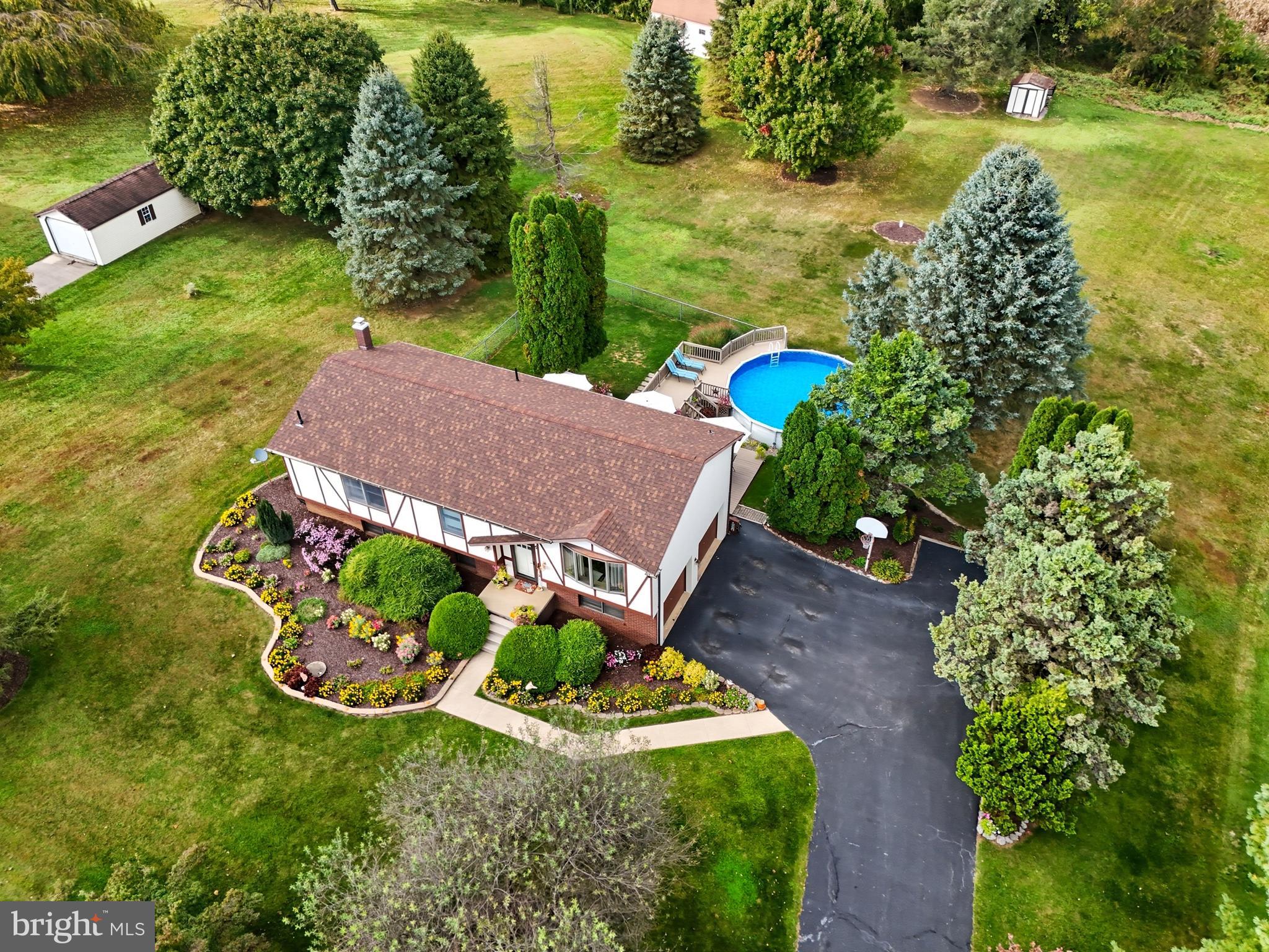 935 Pleasant Grove Road Red Lion, PA 17356 - Photo 56 of 70 an aerial view of a house with garden space and street view