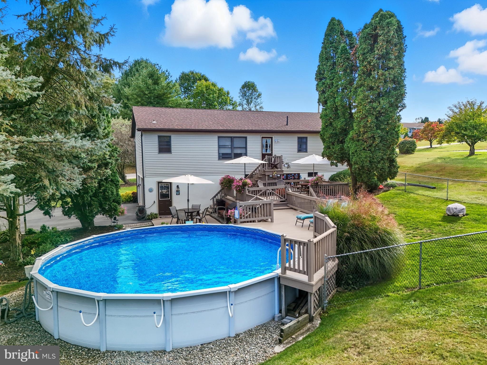 935 Pleasant Grove Road Red Lion, PA 17356 - Photo 62 of 70 a view of a swimming pool with a patio