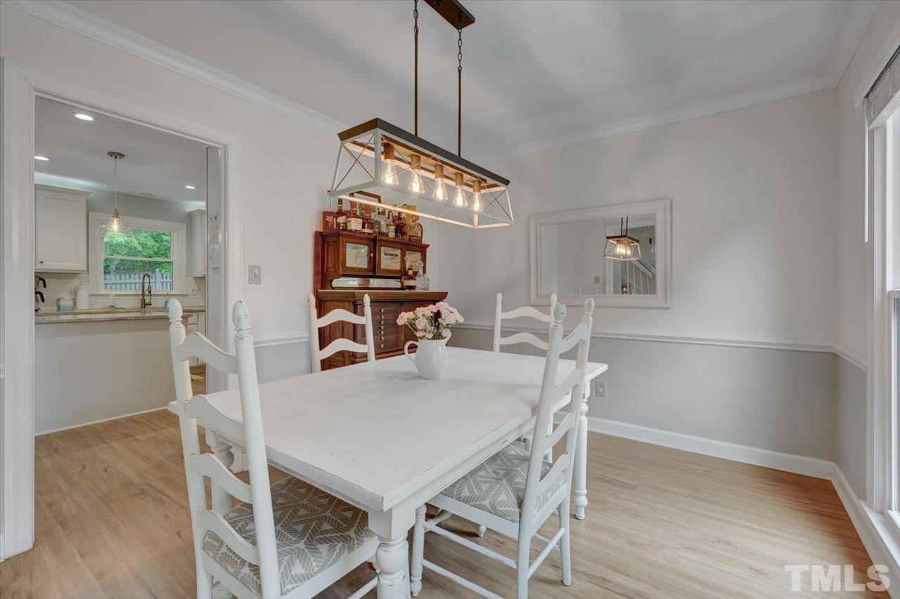 22 Swallows Ridge Court Durham, NC 27713 - Photo 19 of 33 a dining room with furniture and wooden floor