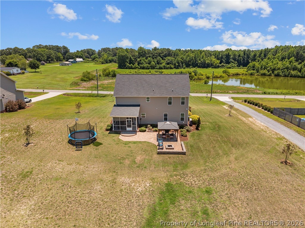 137 Minter School Road Sanford, NC 27332 - Photo 46 of 50 a view of a lake with a yard