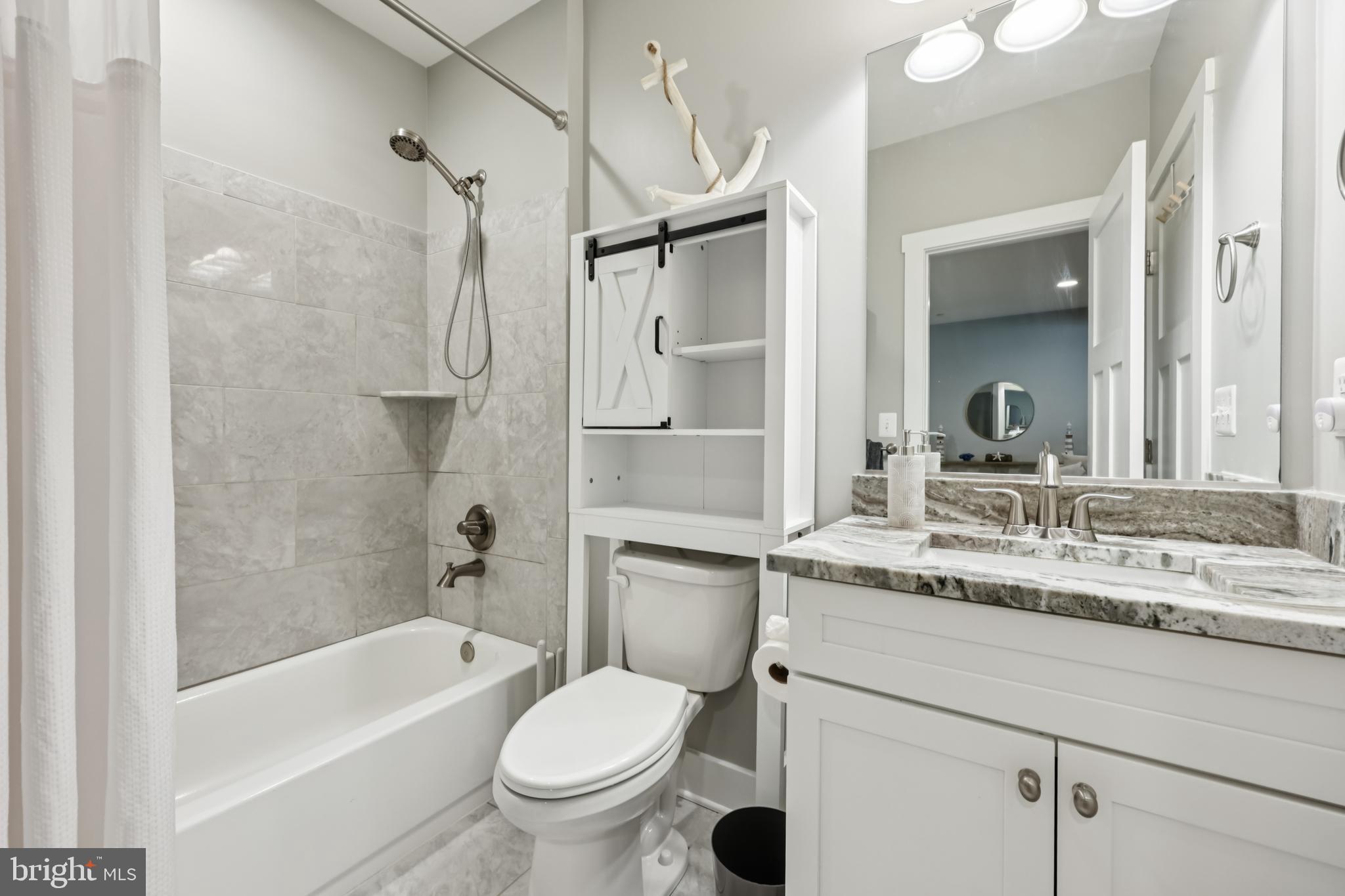 404 Kathe Court Riva, MD 21140 - Photo 54 of 88 a bathroom with a granite countertop sink toilet and shower