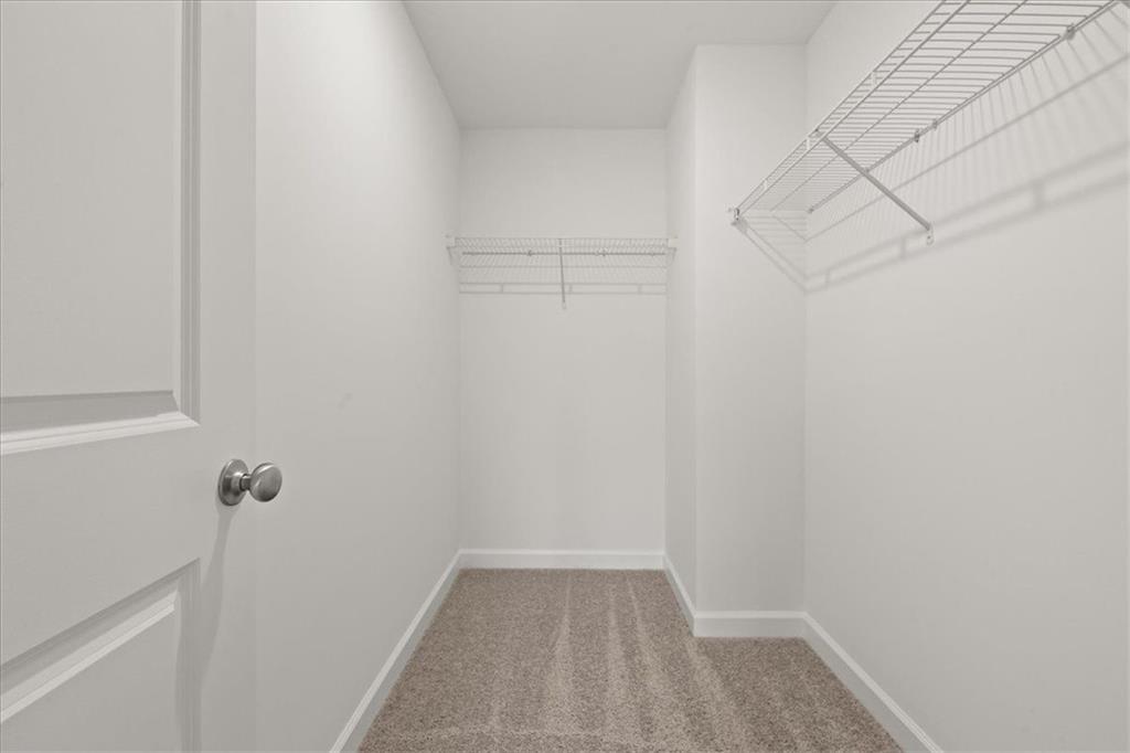 4561 Moray Drive Mableton, GA 30126 - Photo 16 of 34 a view of a room with racks on the wall