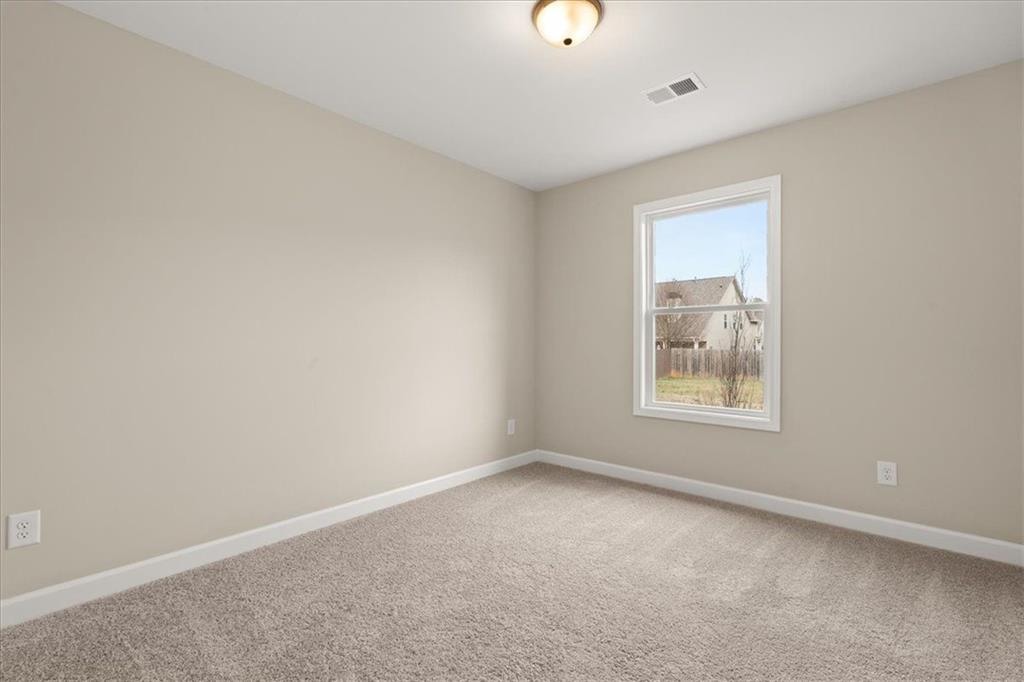 4561 Moray Drive Mableton, GA 30126 - Photo 19 of 34 an empty room with a window