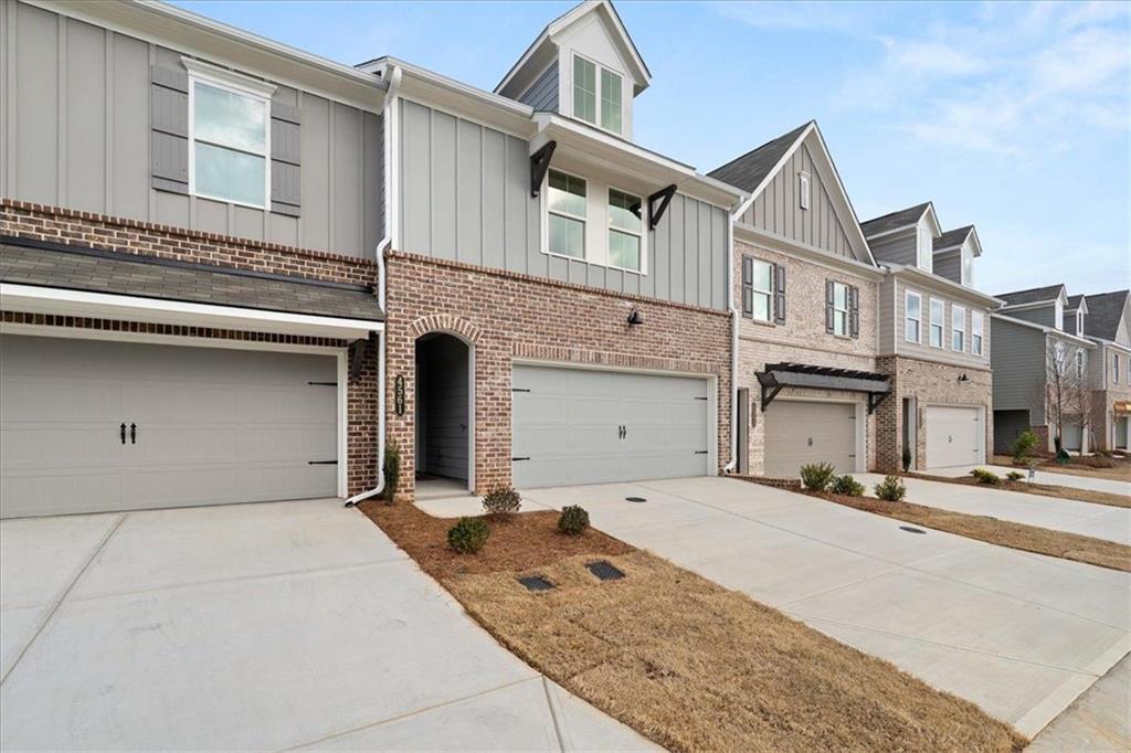 4561 Moray Drive Mableton, GA 30126 - Photo 2 of 34 a front view of a house with a garage