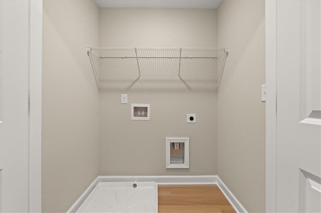 4561 Moray Drive Mableton, GA 30126 - Photo 21 of 34 a bathroom with a window and a shower