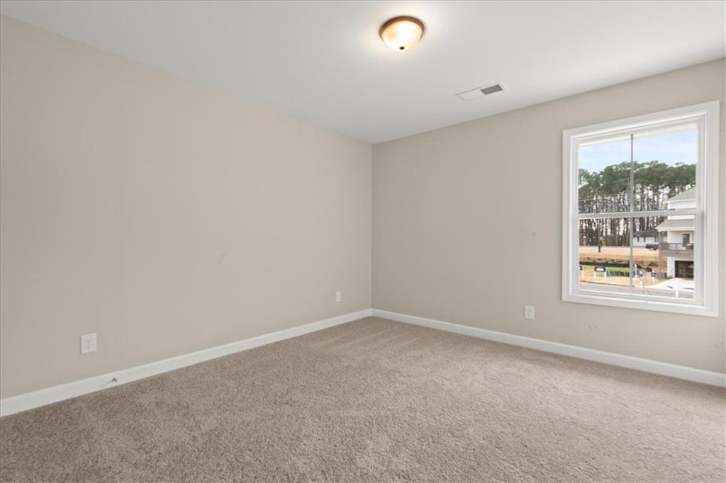 4561 Moray Drive Mableton, GA 30126 - Photo 28 of 34 an empty room with windows