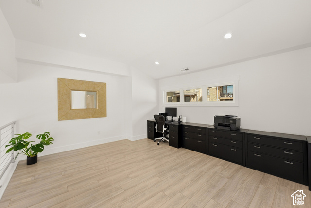 369 East Overlook Loop Kamas, UT 84036 - Photo 27 of 64 Recessed lighting, light wood-finish flooring, a series of horizontal windows, and a built-in black storage system with a dark countertop