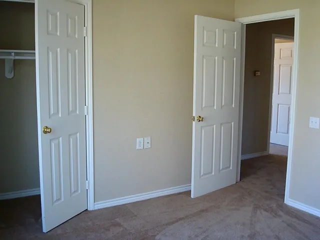 an empty room with windows