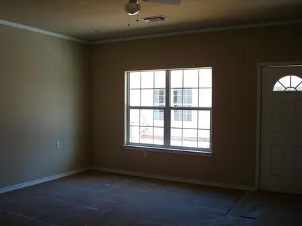 an empty room with a window