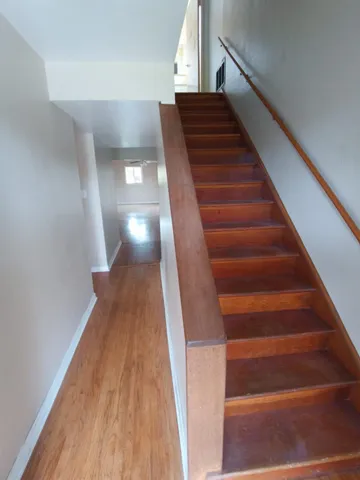 a front view of a house with yard