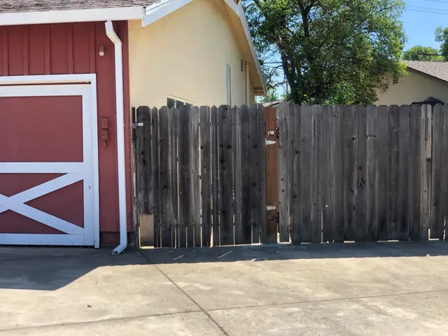a backyard of a house with lots of green space