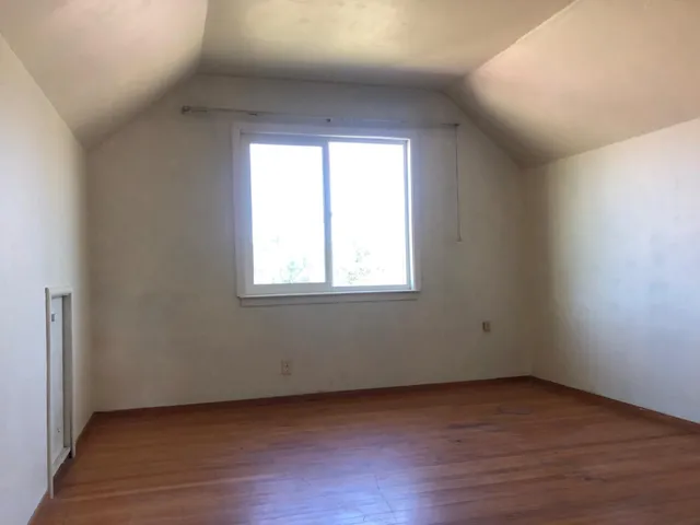 a view of a backyard of the house