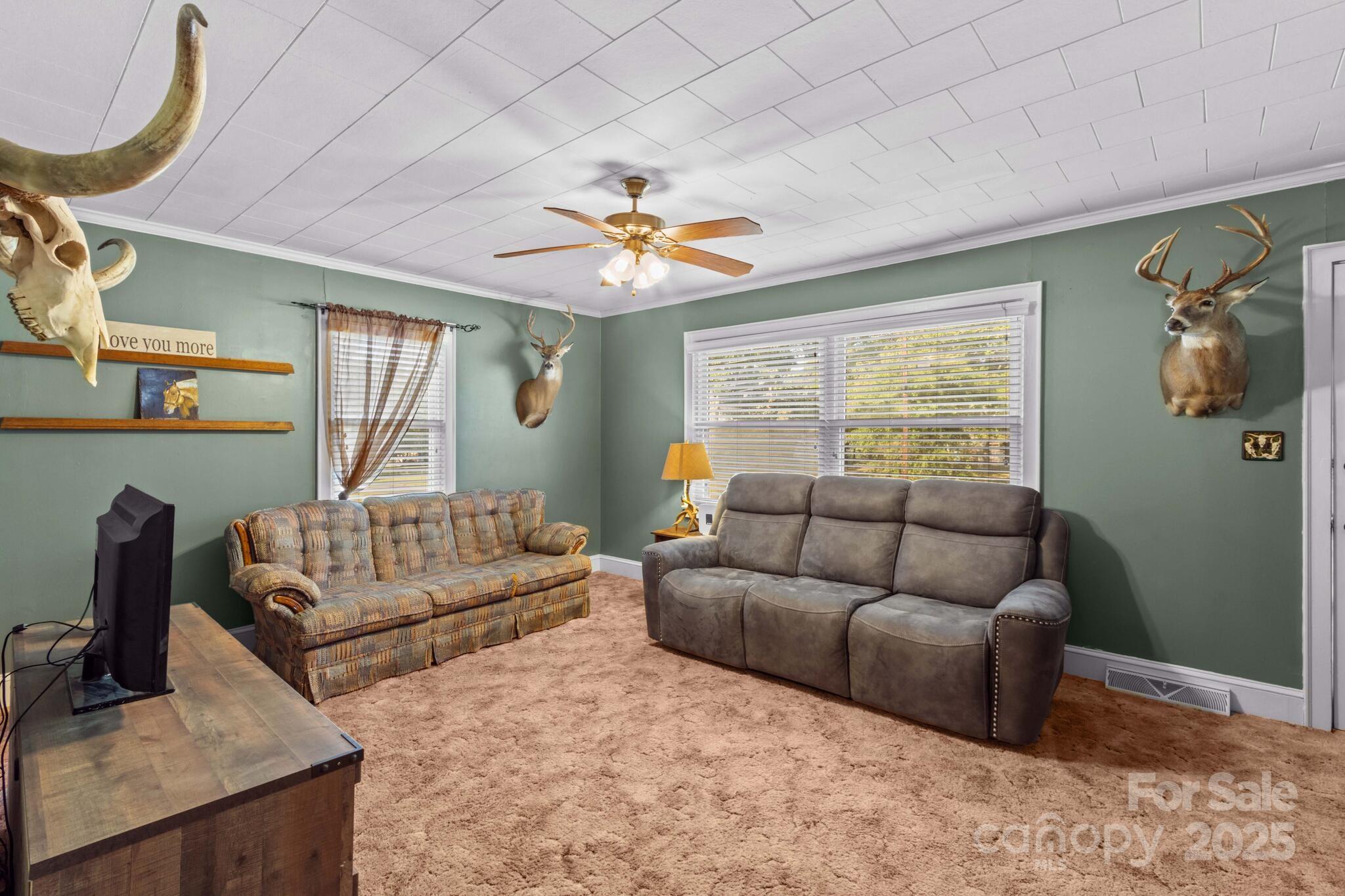 185 Homer Corriher Road China Grove, NC 28023 - Photo 11 of 48 a living room with furniture and a window