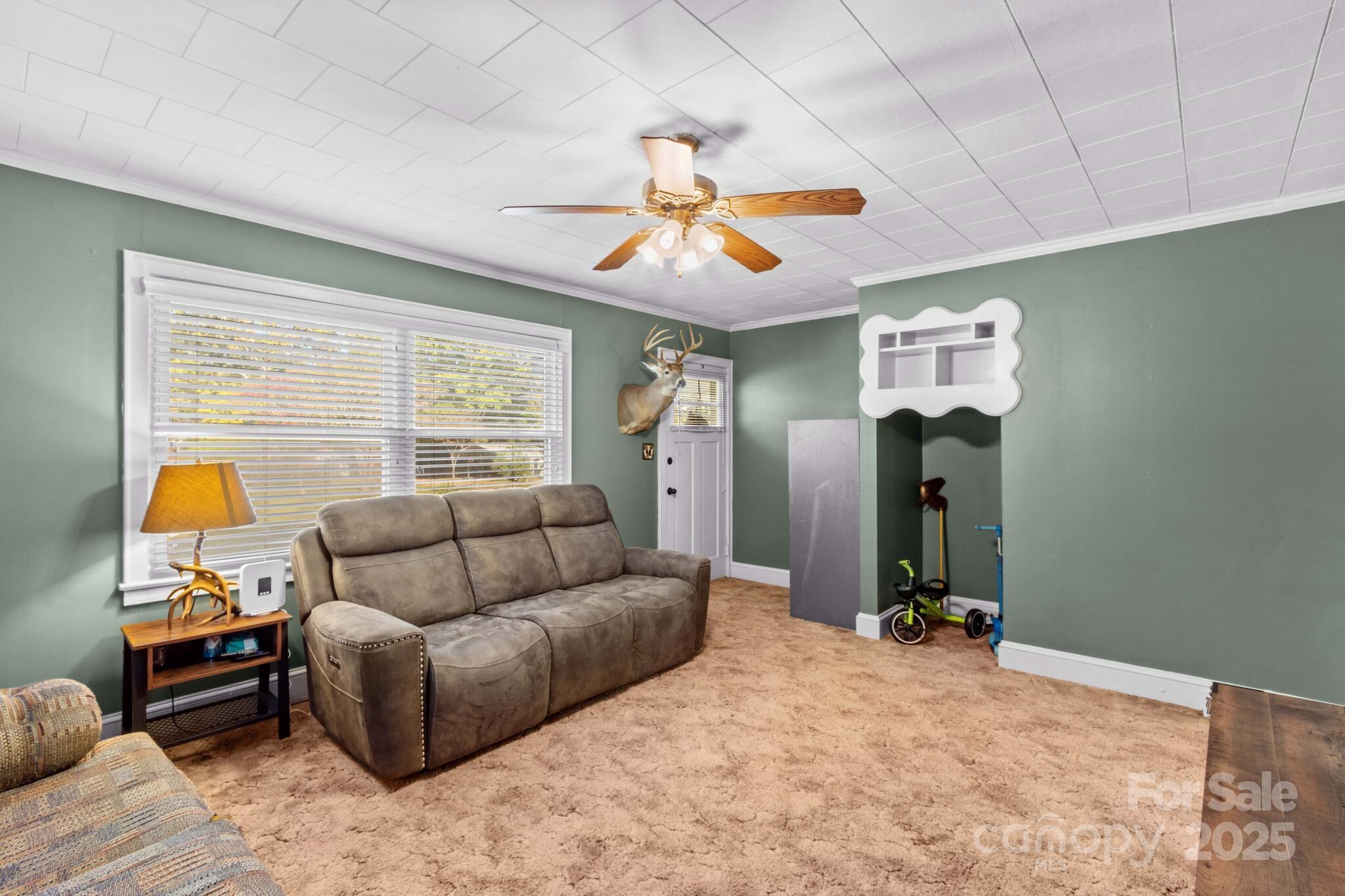 185 Homer Corriher Road China Grove, NC 28023 - Photo 12 of 48 a living room with furniture and a window