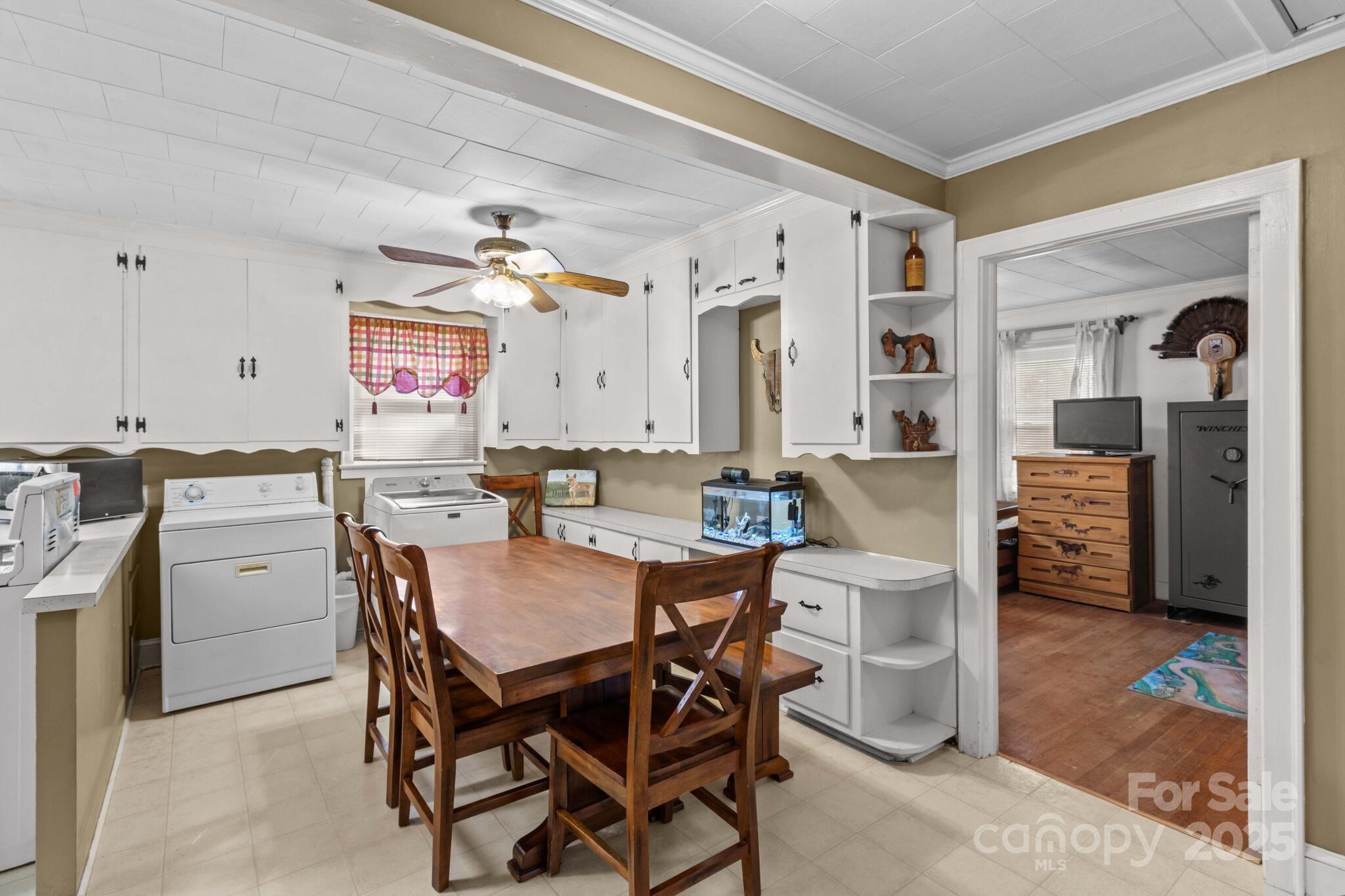 185 Homer Corriher Road China Grove, NC 28023 - Photo 15 of 48 a view of a dining room with furniture