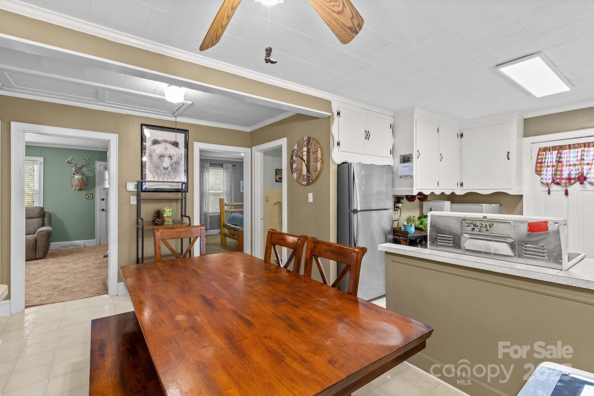 185 Homer Corriher Road China Grove, NC 28023 - Photo 17 of 48 a living room with stainless steel appliances kitchen island granite countertop furniture and a kitchen view