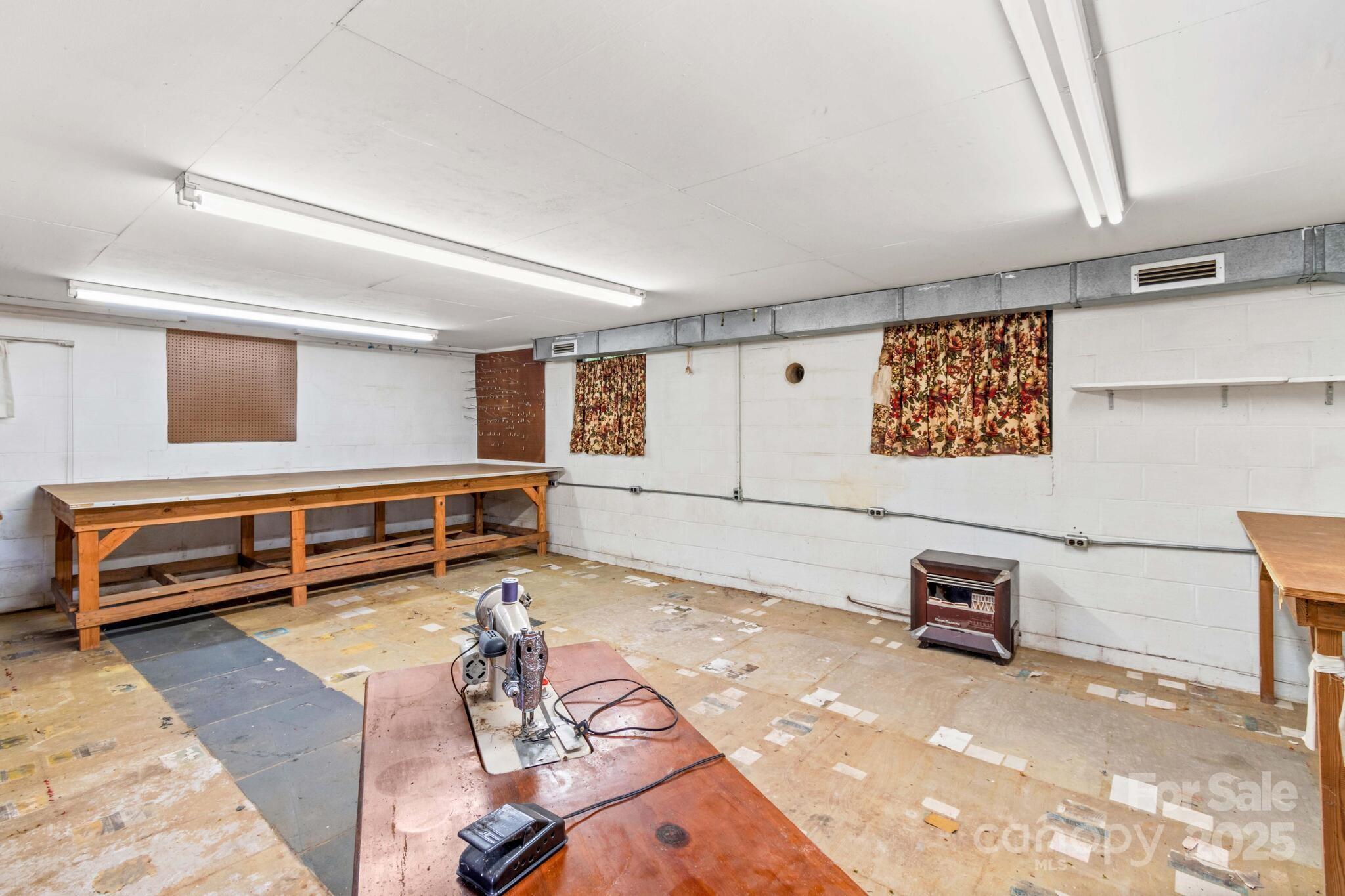 185 Homer Corriher Road China Grove, NC 28023 - Photo 36 of 48 a living room with furniture and a window