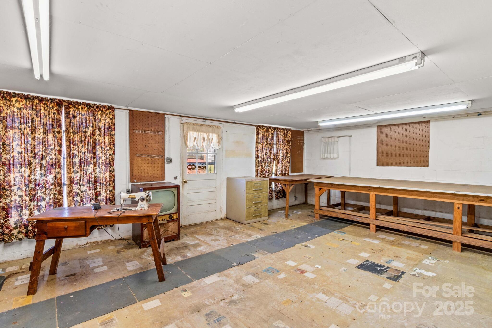 185 Homer Corriher Road China Grove, NC 28023 - Photo 37 of 48 a bedroom with furniture and a window