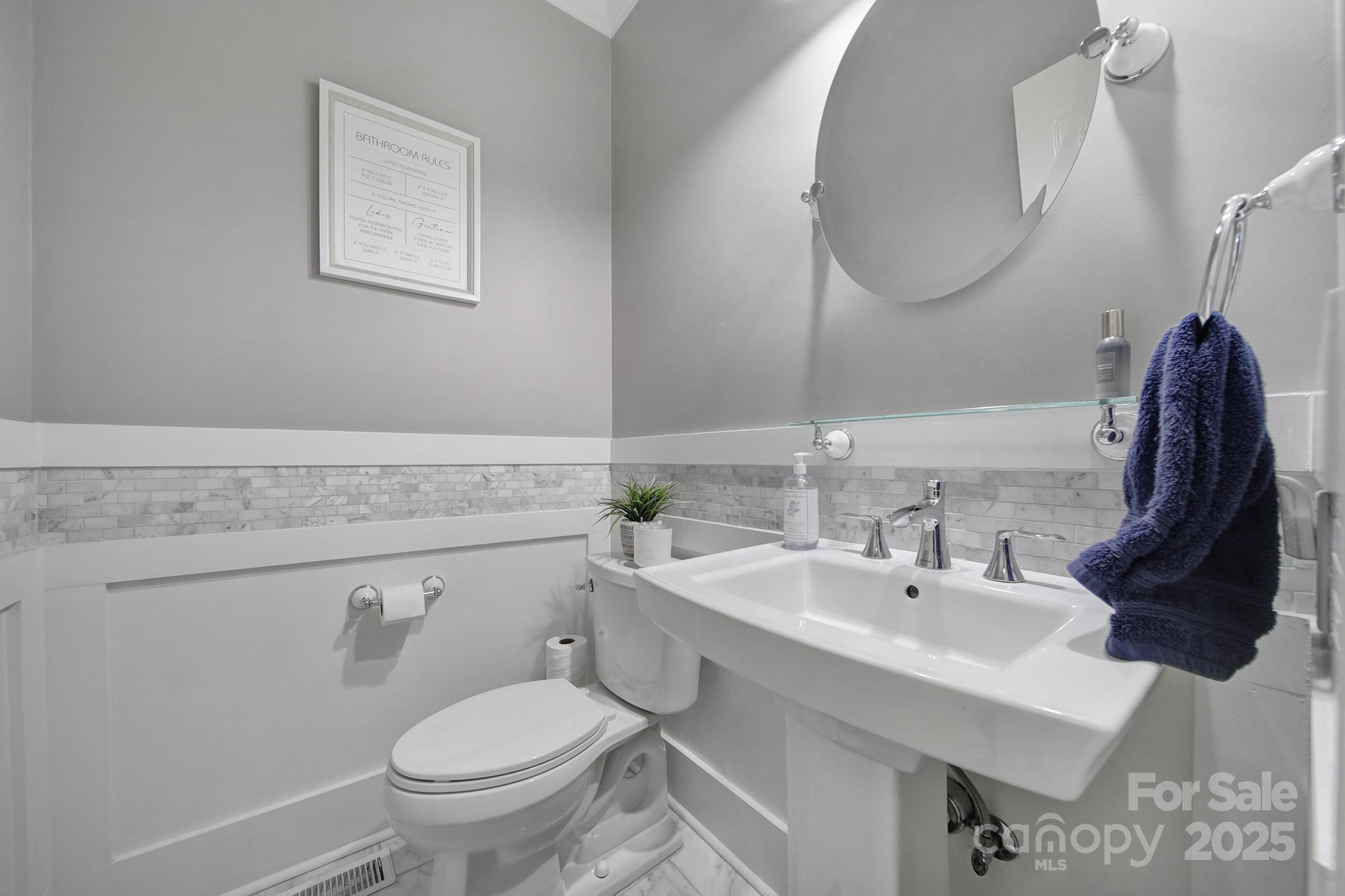 726 Amberly Crossing Fort Mill, SC 29708 - Photo 14 of 47 a bathroom with a sink and a mirror