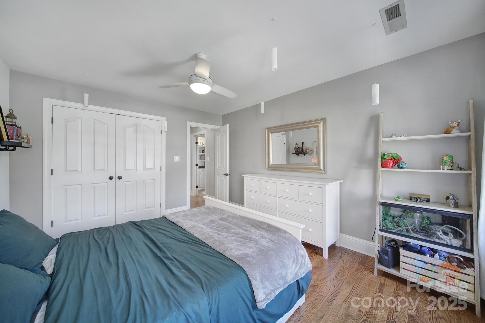 726 Amberly Crossing Fort Mill, SC 29708 - Photo 27 of 47 a bedroom with a bed and a view of kitchen