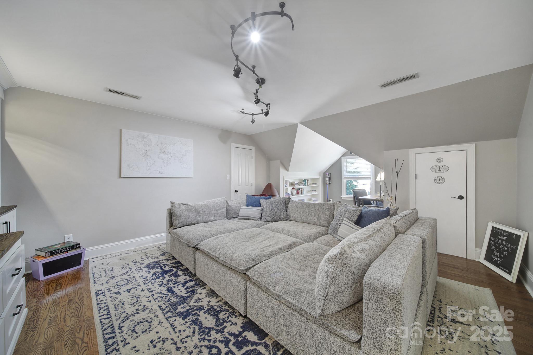 726 Amberly Crossing Fort Mill, SC 29708 - Photo 29 of 47 a spacious bedroom with a bed and ceiling fan