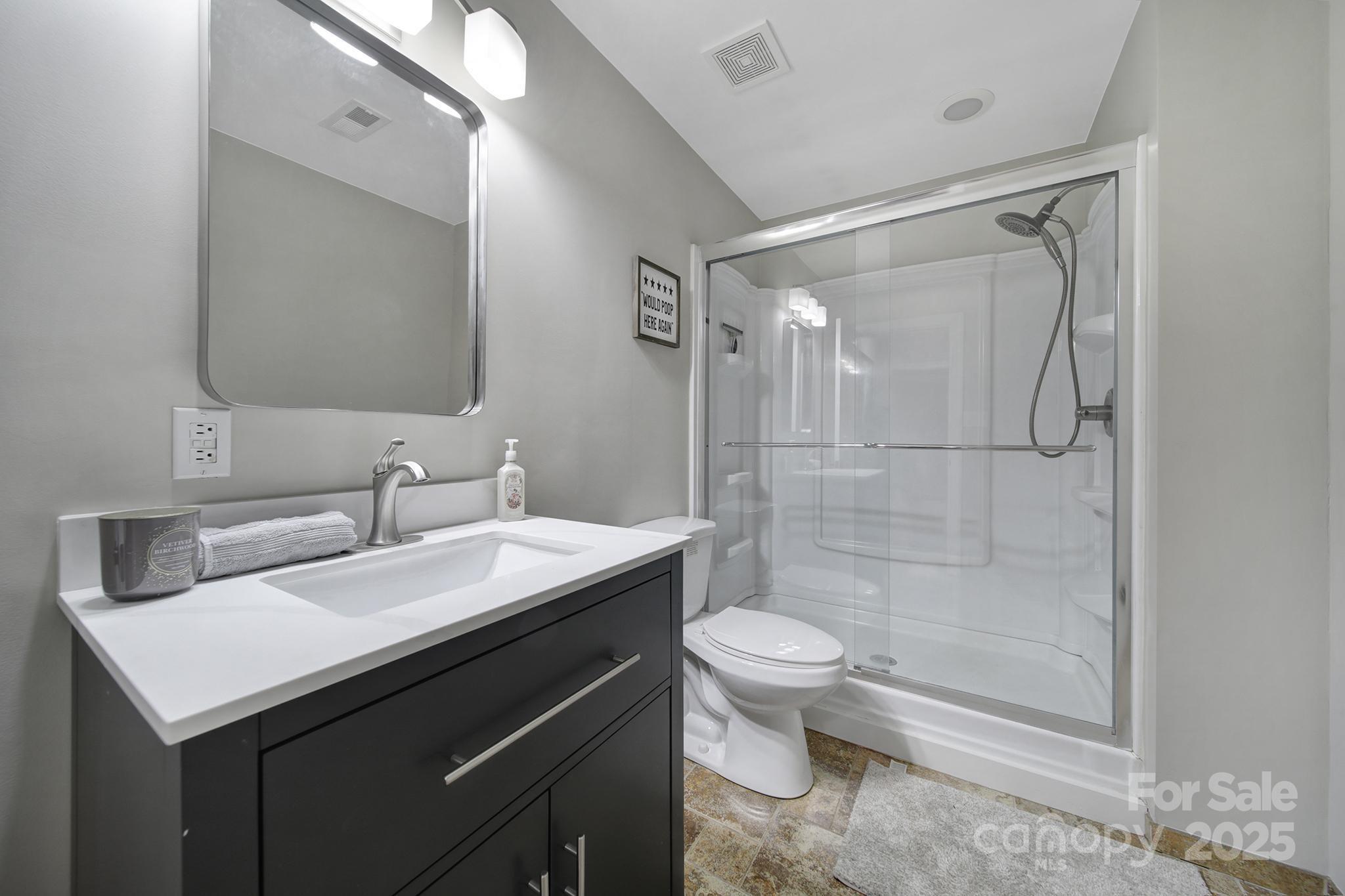 726 Amberly Crossing Fort Mill, SC 29708 - Photo 35 of 47 a bathroom with a sink a toilet and shower