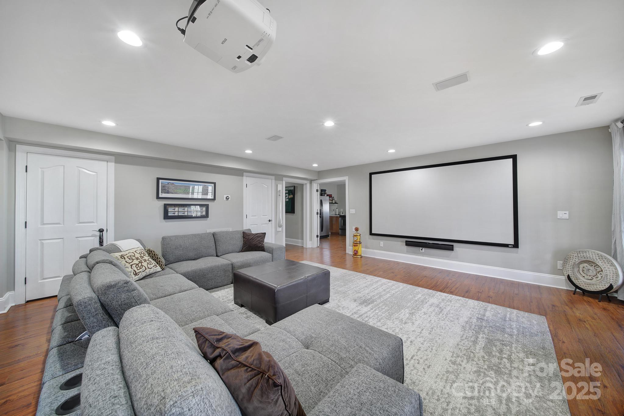 726 Amberly Crossing Fort Mill, SC 29708 - Photo 37 of 47 a living room with furniture and a flat screen tv