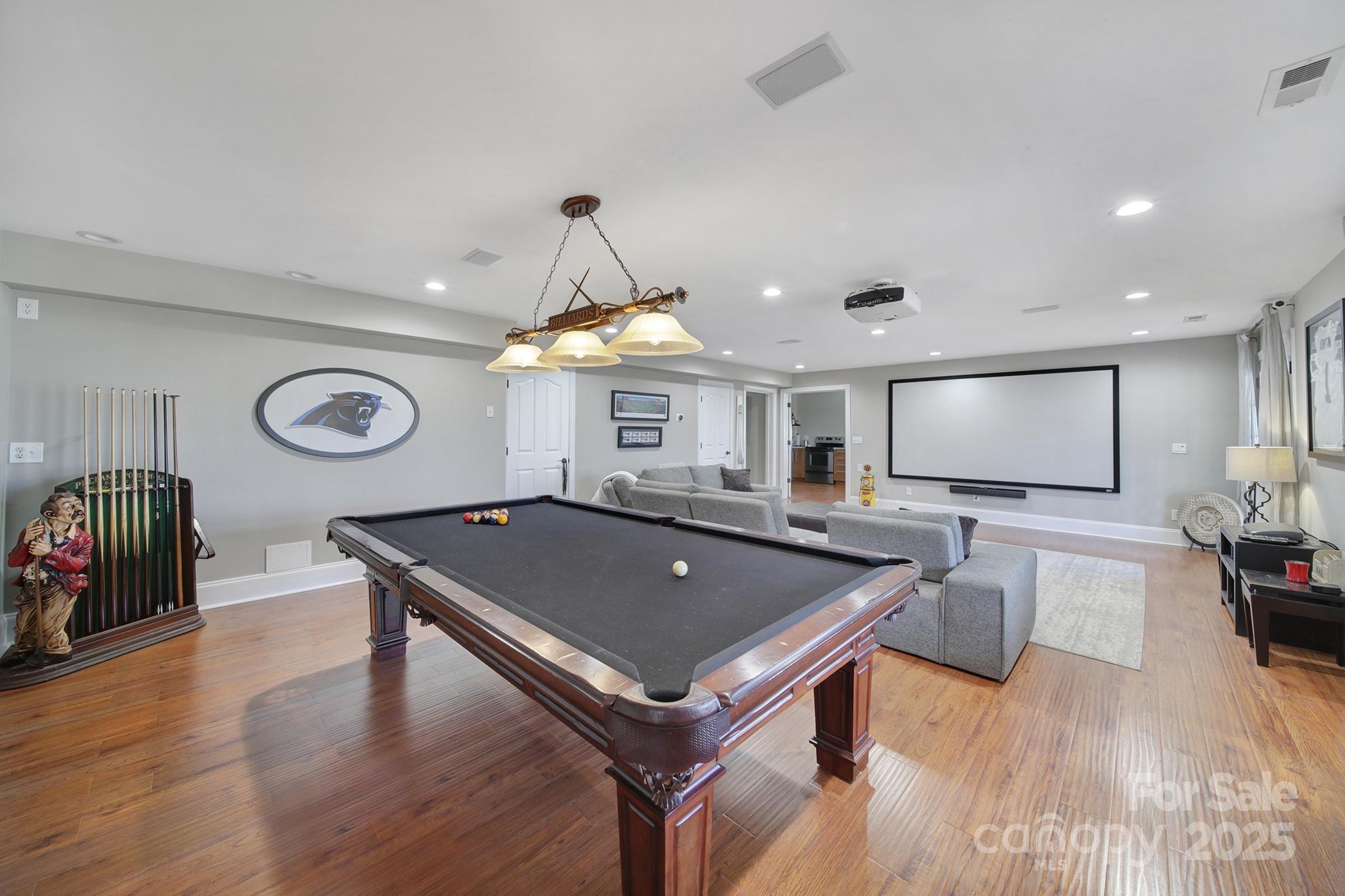 726 Amberly Crossing Fort Mill, SC 29708 - Photo 39 of 47 a living room with stainless steel appliances furniture and a table