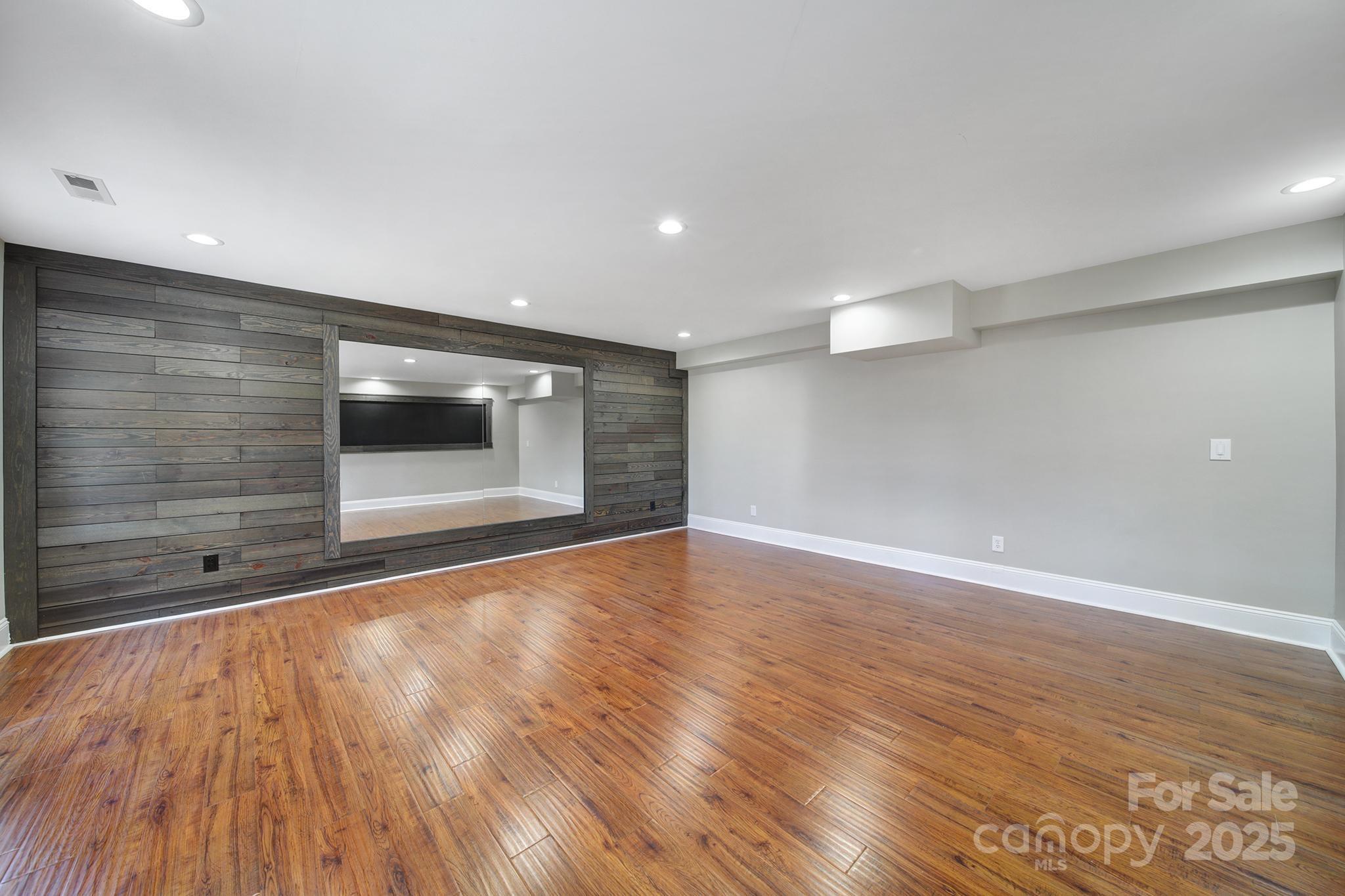 726 Amberly Crossing Fort Mill, SC 29708 - Photo 40 of 47 a view of an empty room with wooden floor