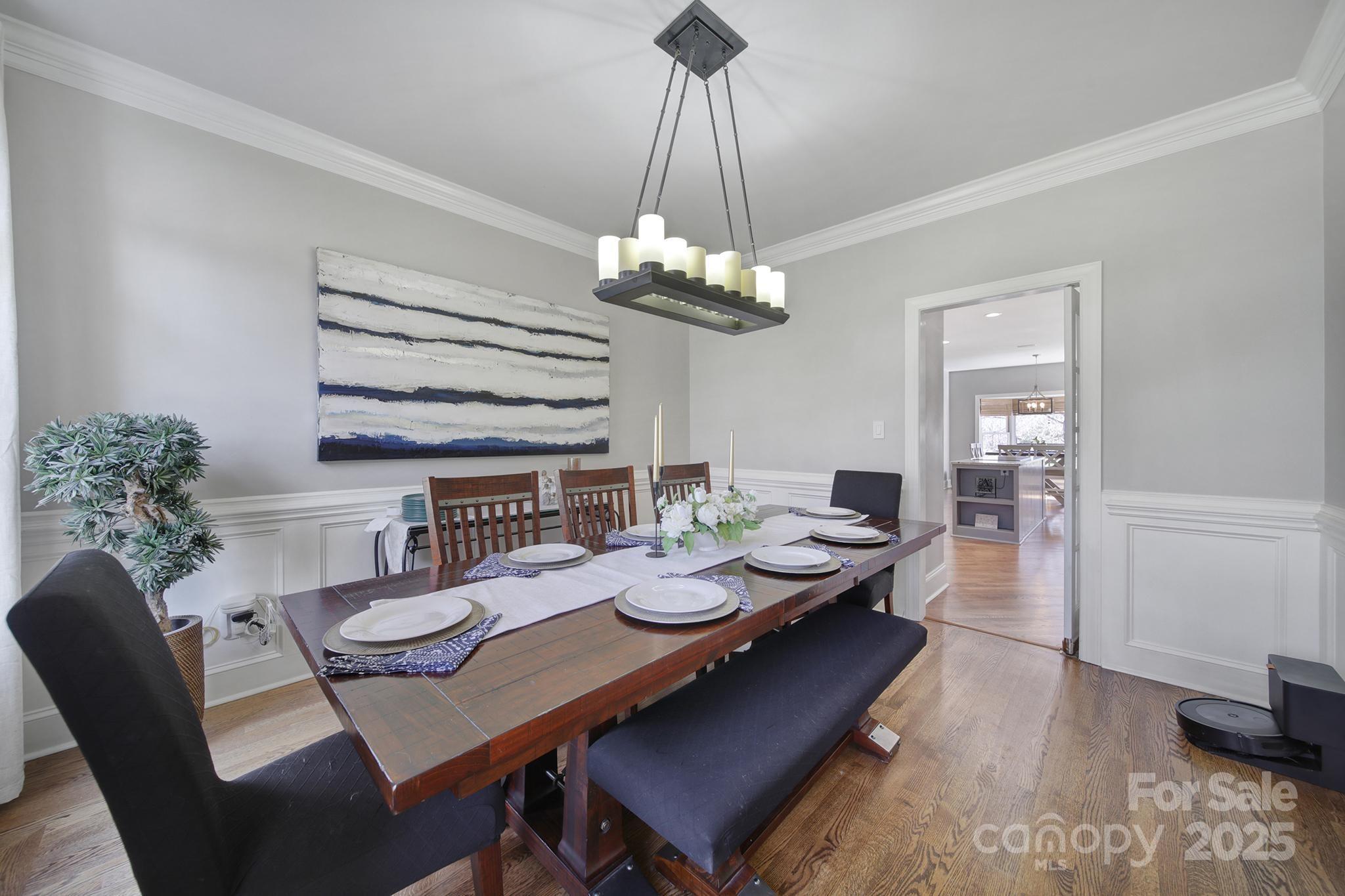 726 Amberly Crossing Fort Mill, SC 29708 - Photo 5 of 47 a view of a dining room with furniture wooden floor and chandelier
