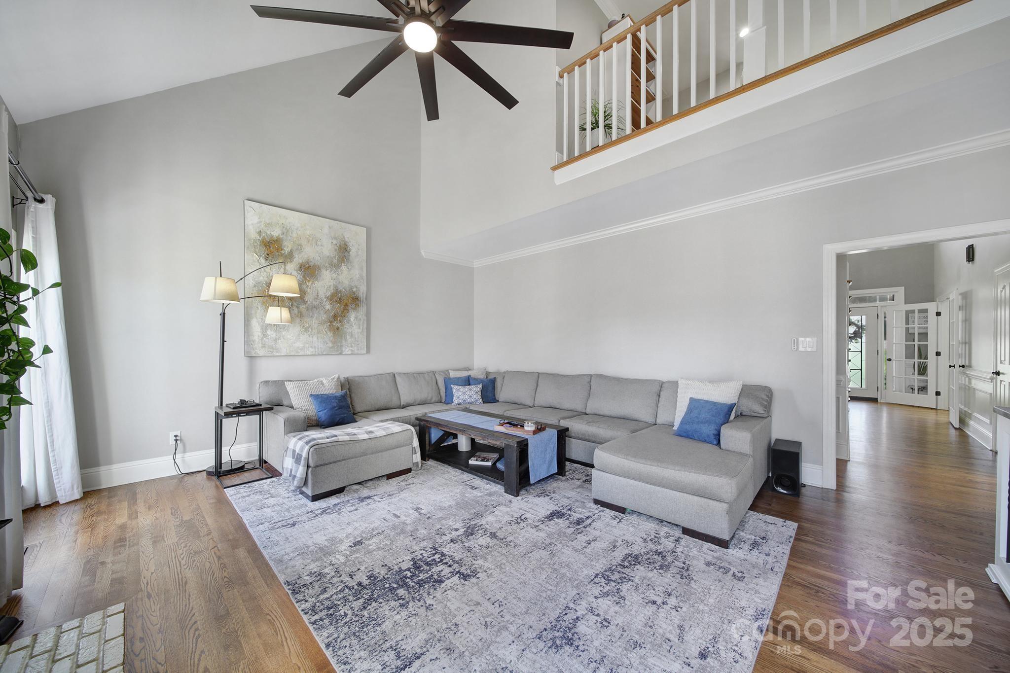 726 Amberly Crossing Fort Mill, SC 29708 - Photo 7 of 47 a living room with furniture and a wooden floor