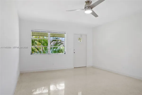 an empty room with window