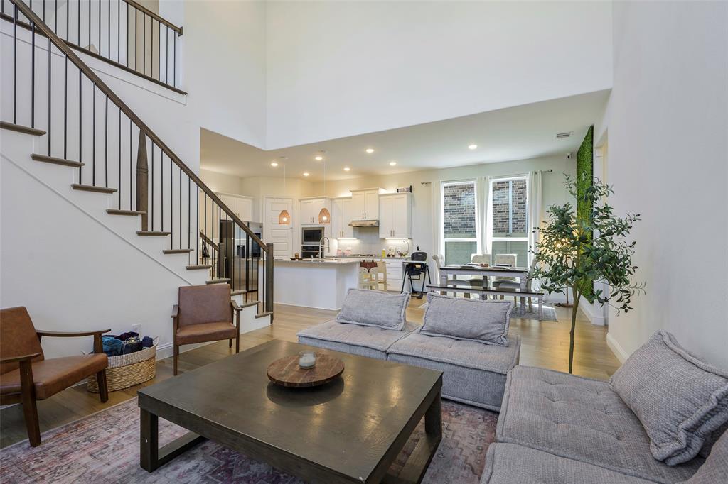 3603 Scotsman Road Sachse, TX 75048 - Photo 4 of 33 a living room with furniture and a table