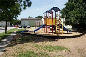 6200 West Tidwell Road, Unit 304 Houston, TX 77092 - Photo 1 of 14 a view of swimming pool with a yard