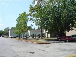 6200 West Tidwell Road, Unit 304 Houston, TX 77092 - Photo 13 of 14 a view of road with trees