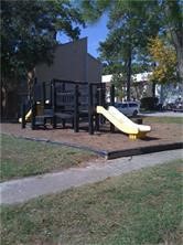 6200 West Tidwell Road, Unit 304 Houston, TX 77092 - Photo 14 of 14 a view of outdoor space with playground and green space