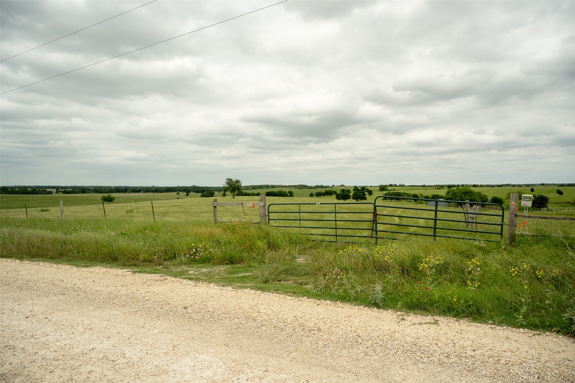 1716 B Cr Coupland, TX 78615 - Photo 18 of 40 a view of a lake with a yard
