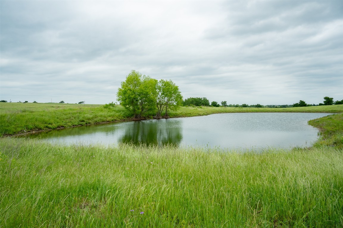 1716 B Cr Coupland, TX 78615 - Photo 23 of 40 a view of a lake with a big yard