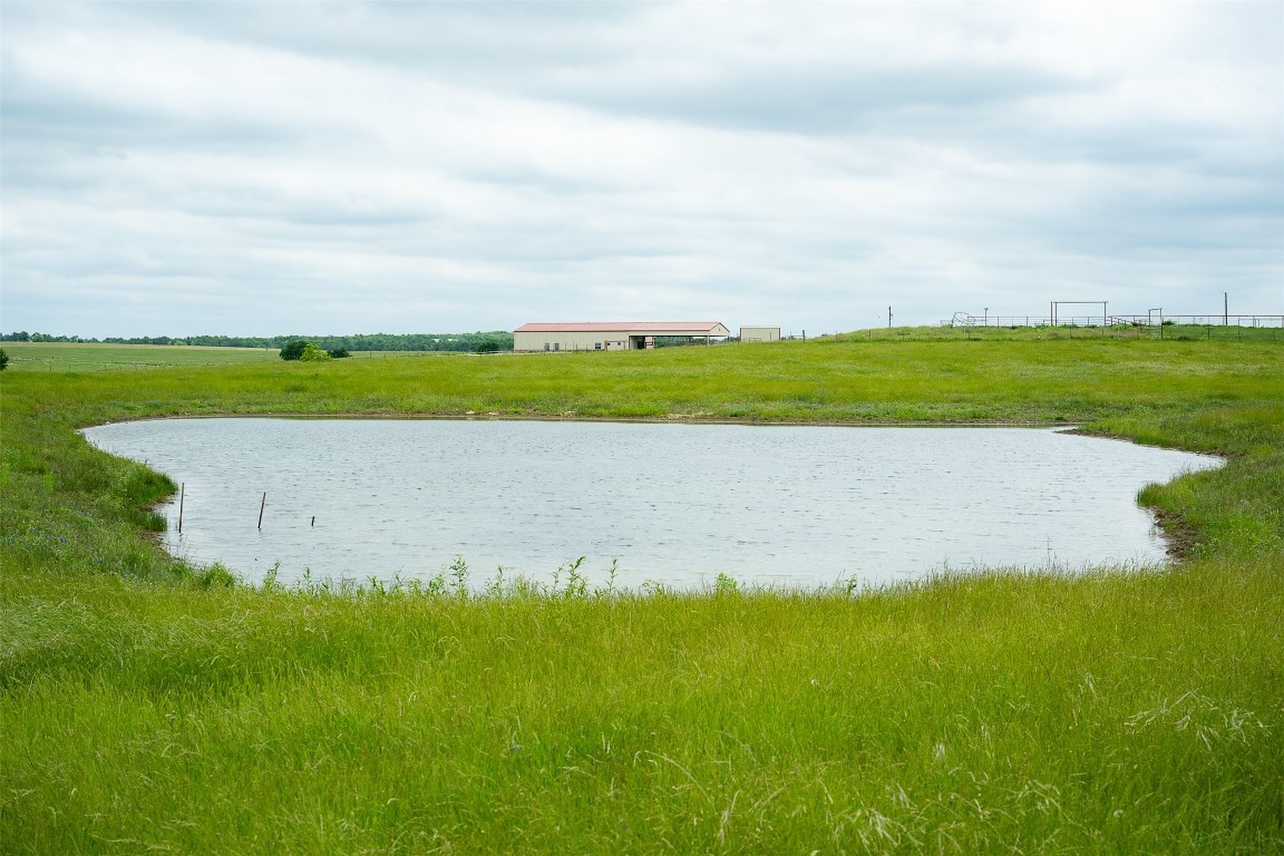 1716 B Cr Coupland, TX 78615 - Photo 25 of 40 a view of a big yard with large trees
