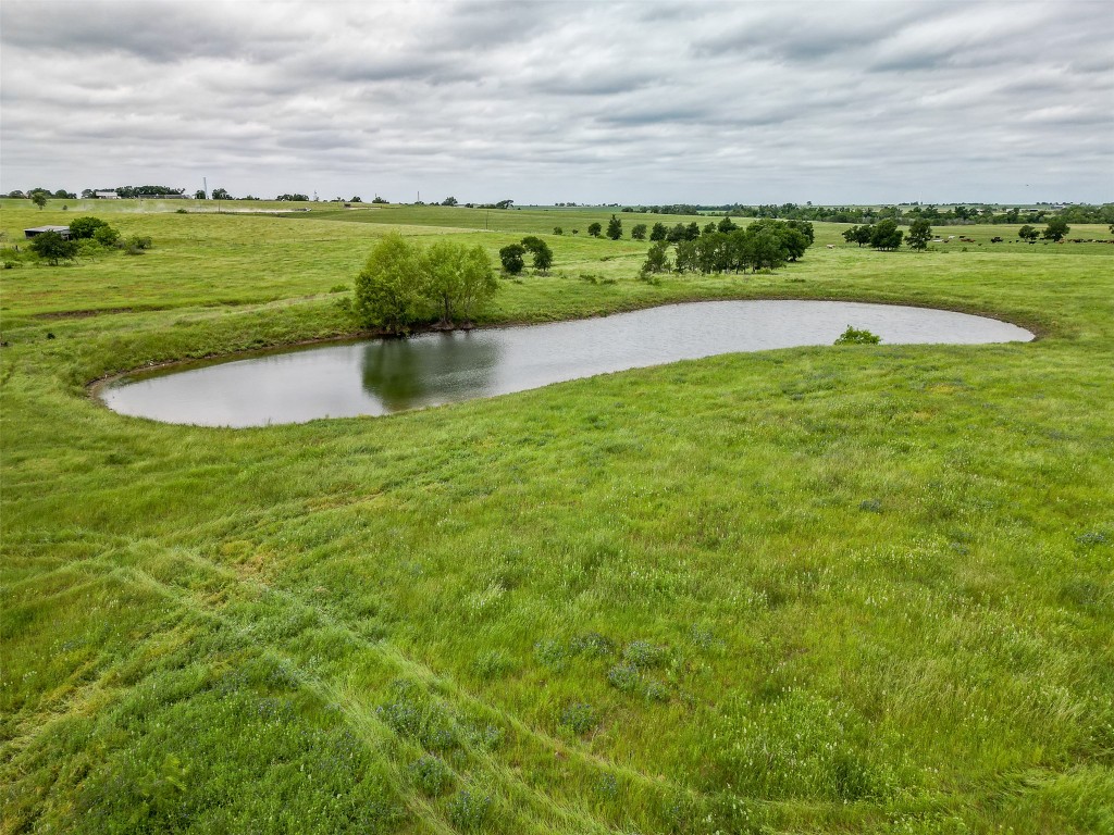 1716 B Cr Coupland, TX 78615 - Photo 27 of 40 a view of a lake with a big yard