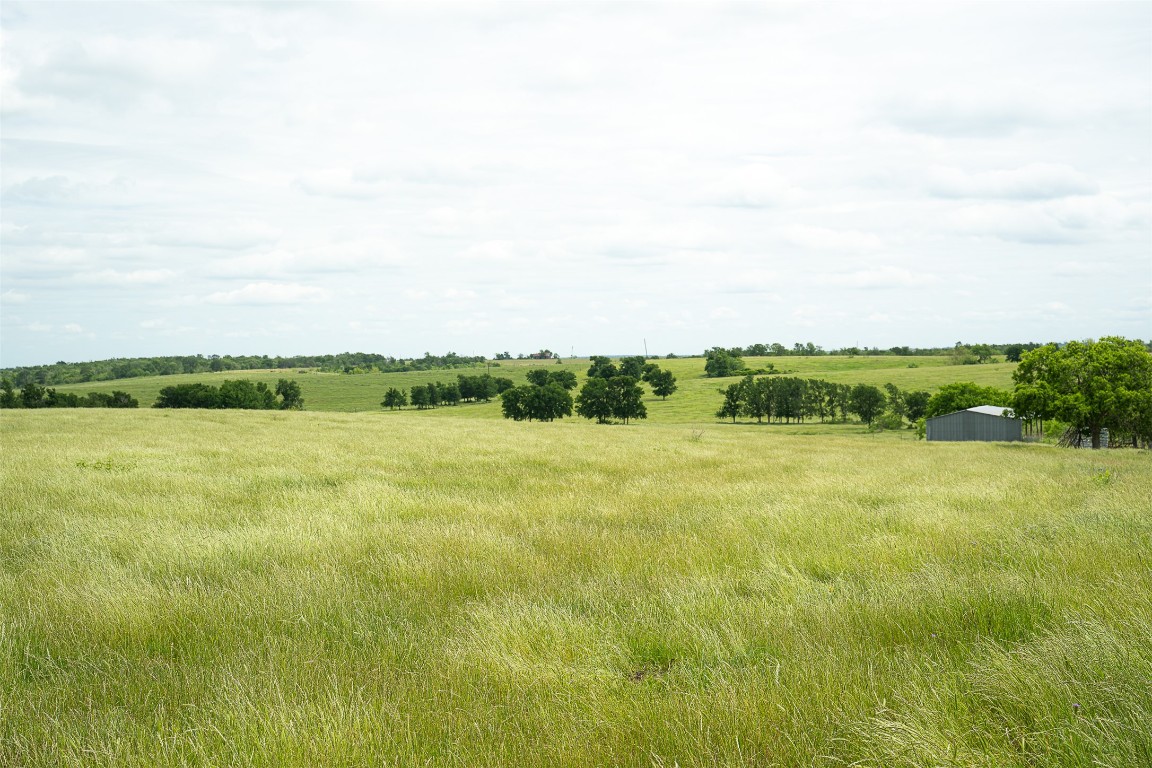 1716 B Cr Coupland, TX 78615 - Photo 7 of 40 a view of a field with an ocean