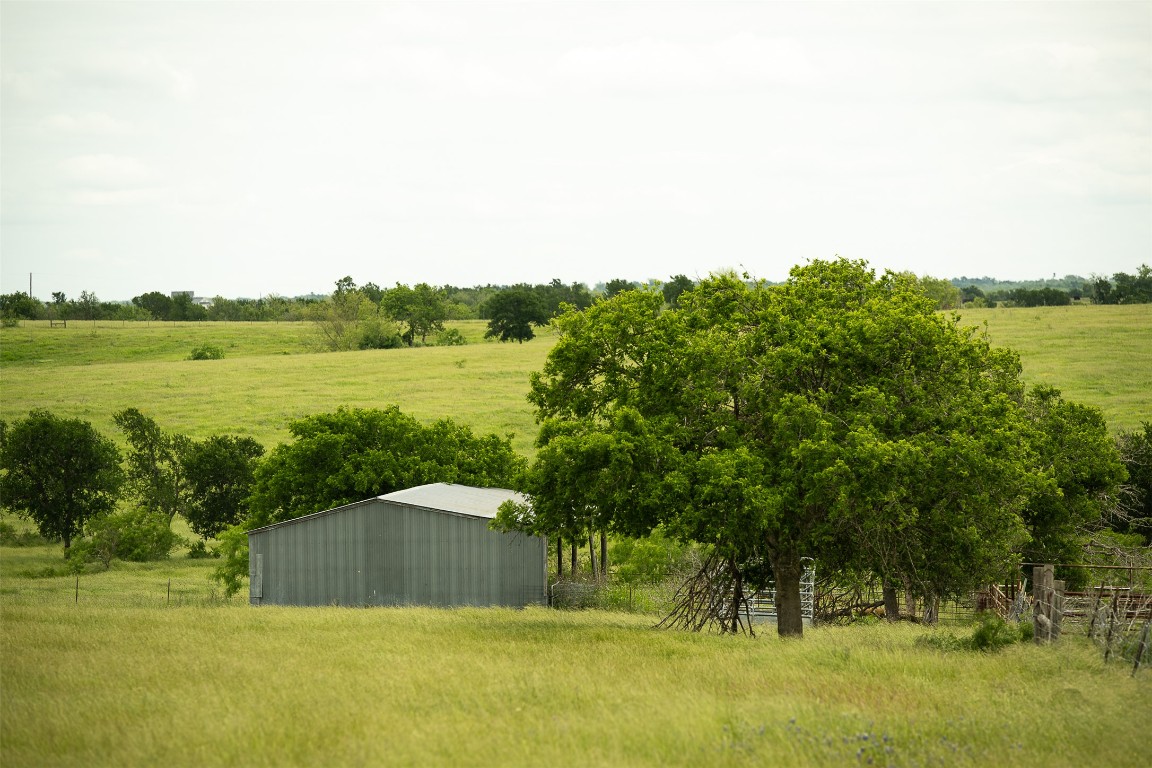 1716 B Cr Coupland, TX 78615 - Photo 9 of 40 a view of a lake with a big yard