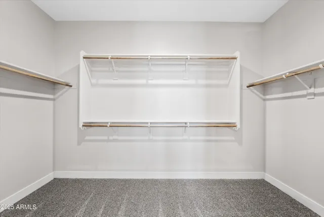 a view of an empty walk in closet